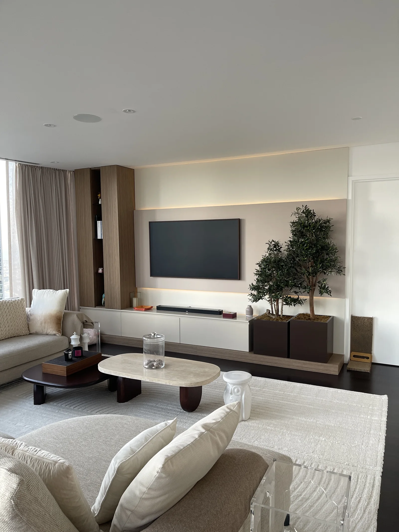 Integrated media wall and timber-toned storage.