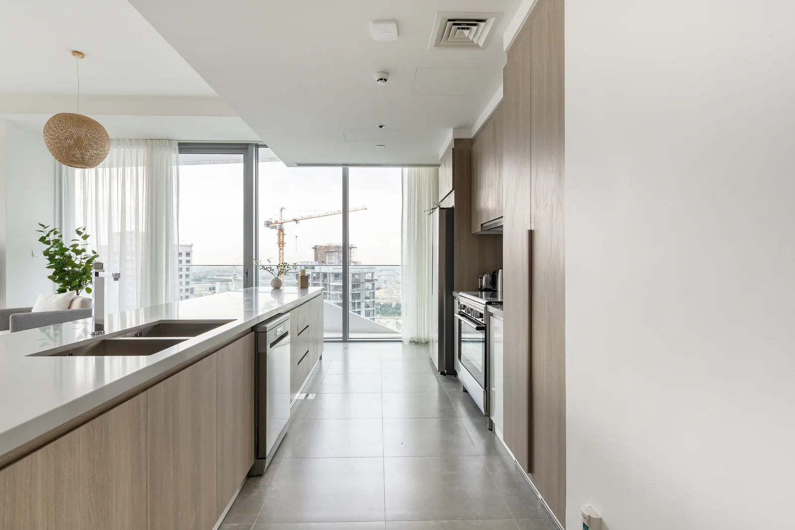 Kitchen cabinetry and working side of island.