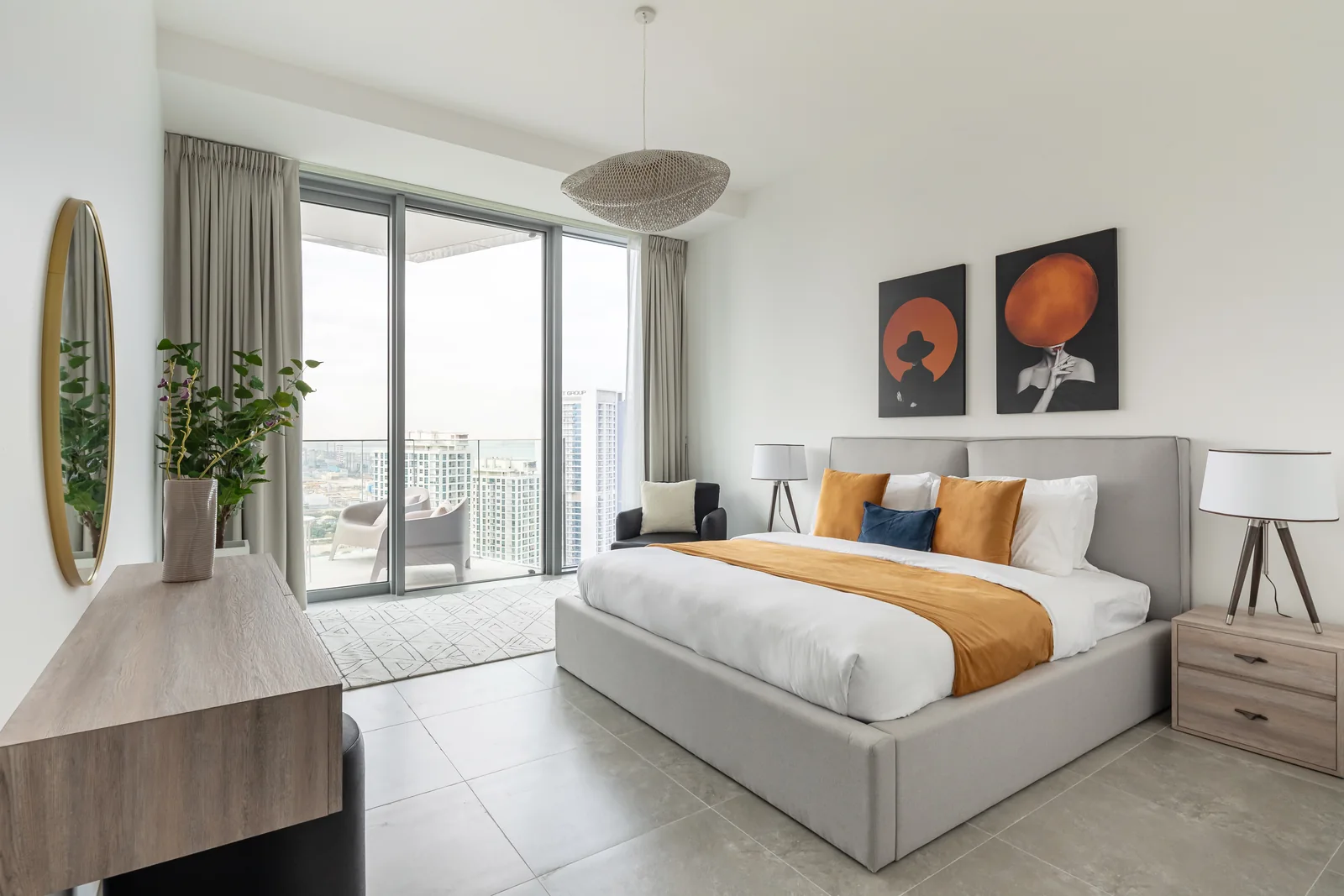 Ochre-accent bedroom and timber-toned dressing furniture.