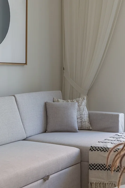 Sofa upholstery, cushions and curtain texture.