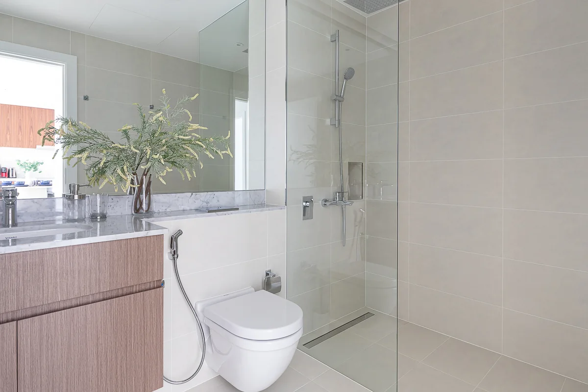 Bathroom vanity and glass shower.